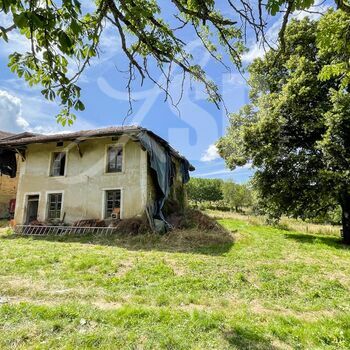 Maison à réhabiliter avec terrain